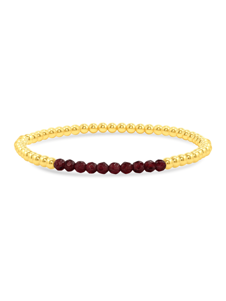 Garnet and gold fill beaded bracelet on white background