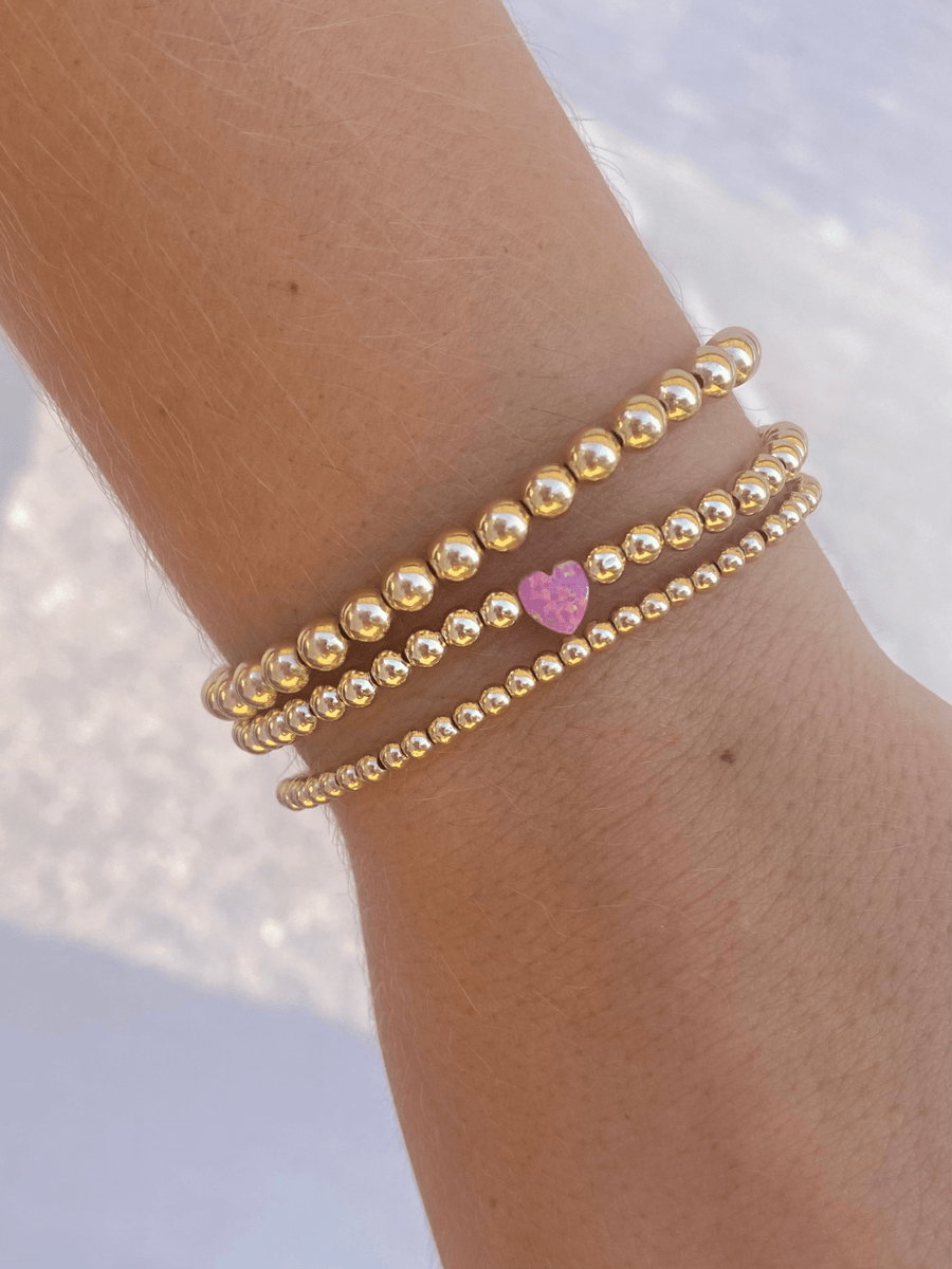 Pink Awareness 3 Stone Bracelet in 14k Gold