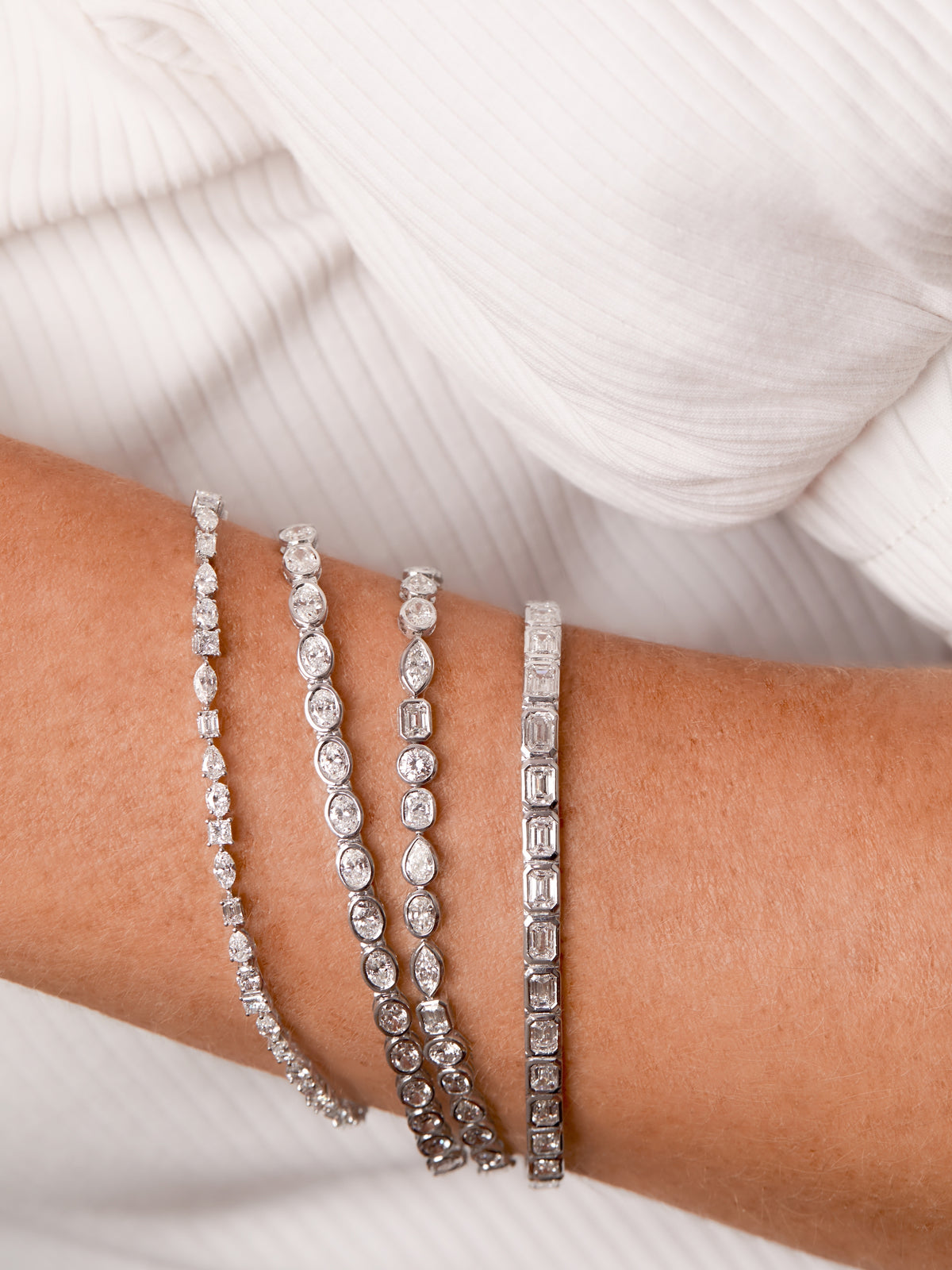 Lab Diamond Bezel Tennis Bracelets - Oval 14K