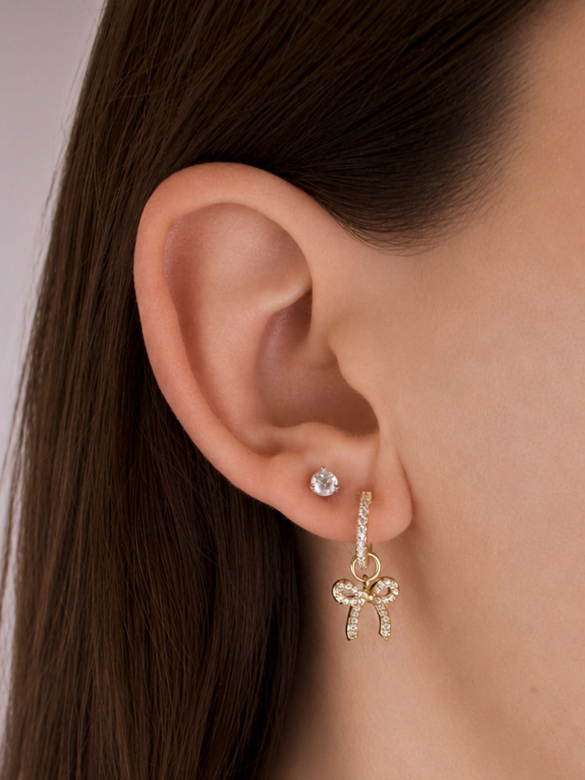 Lucy Bow Charm Huggie Earrings