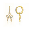 Lucy Bow Charm Huggie Earrings