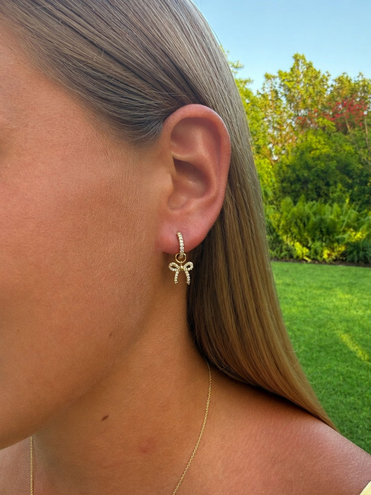 Lucy Bow Charm Huggie Earrings