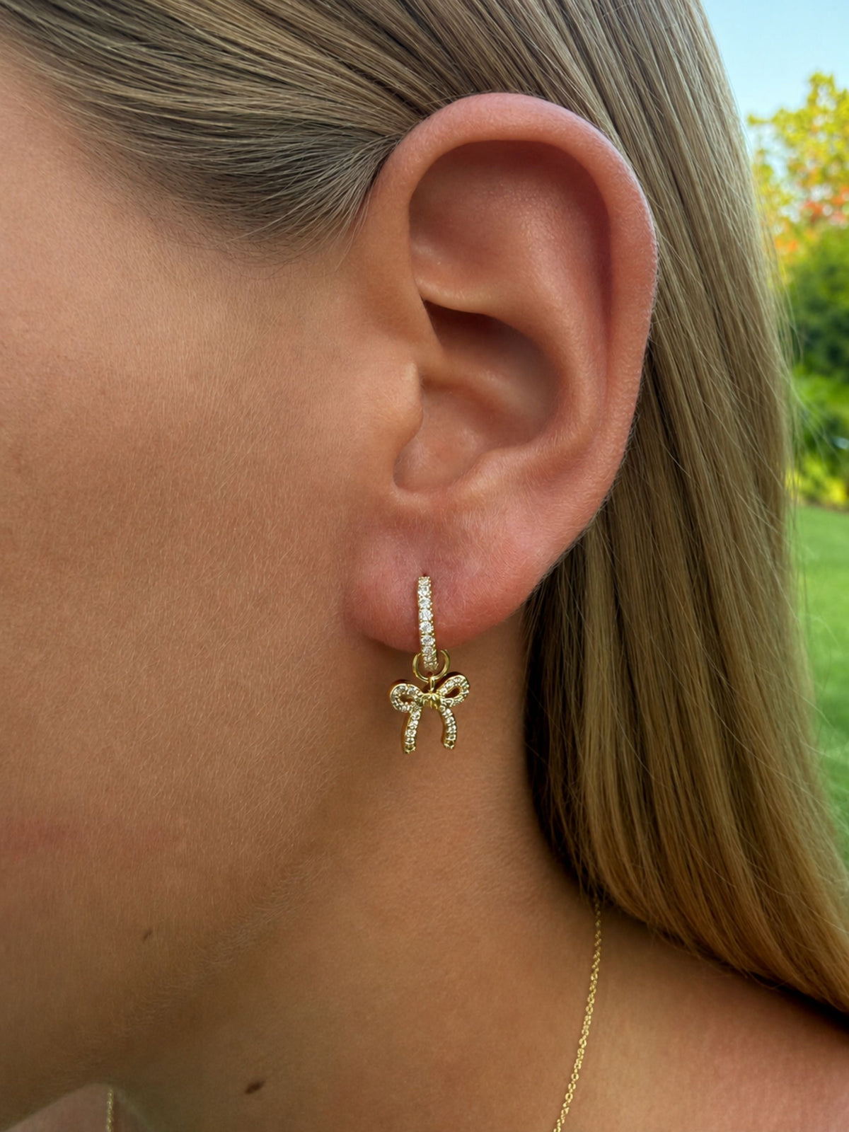 Lucy Bow Charm Huggie Earrings