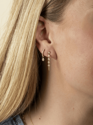 Floating Diamond Huggie Earrings 14K