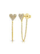 Heart-shaped gold earrings with chain details on a white background