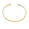 yellow gold beaded bracelet with bezel diamonds with white background