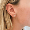 Larger diamond star stud paired with mini star stud and trio star diamond stud