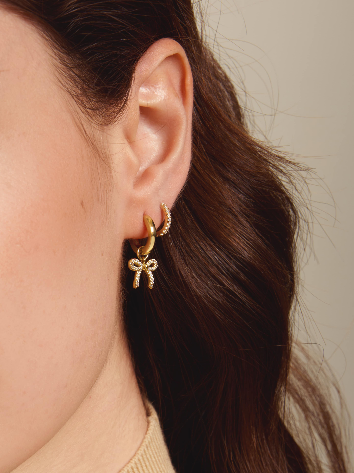 Lucy Bow Charm Huggie Earrings