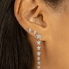 Oval diamond studs paired with pear diamond studs and diamond star dangle earring