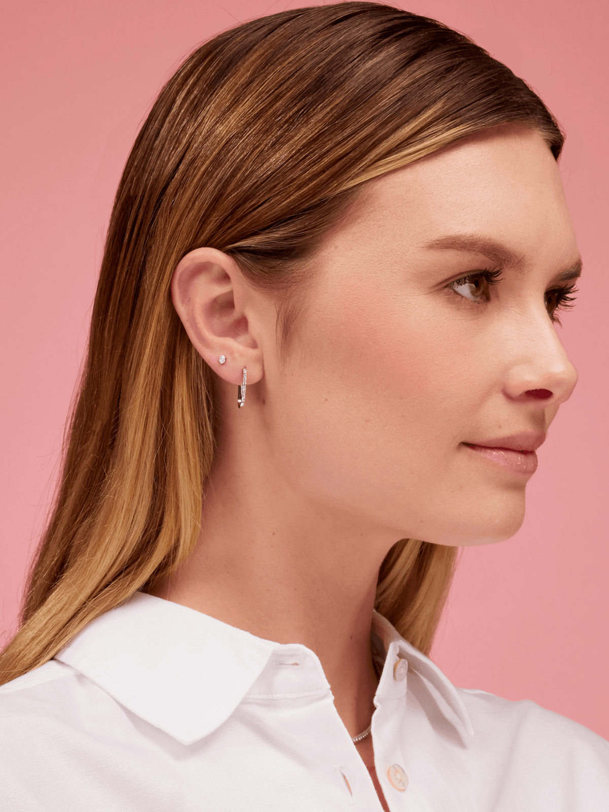 Oval diamond stud earrings white gold paired with paperclip diamond huggie