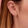 Diamond Paperclip Earring in White Gold on Ear in First Hole of Ear and Small Oval Diamond Stud in Second Hole