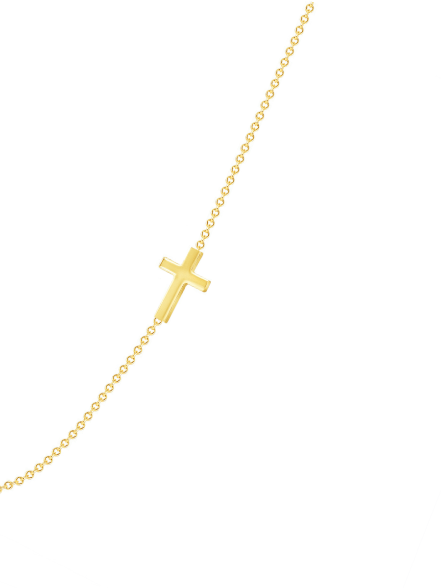 Dainty gold chain with simple gold cross charm 