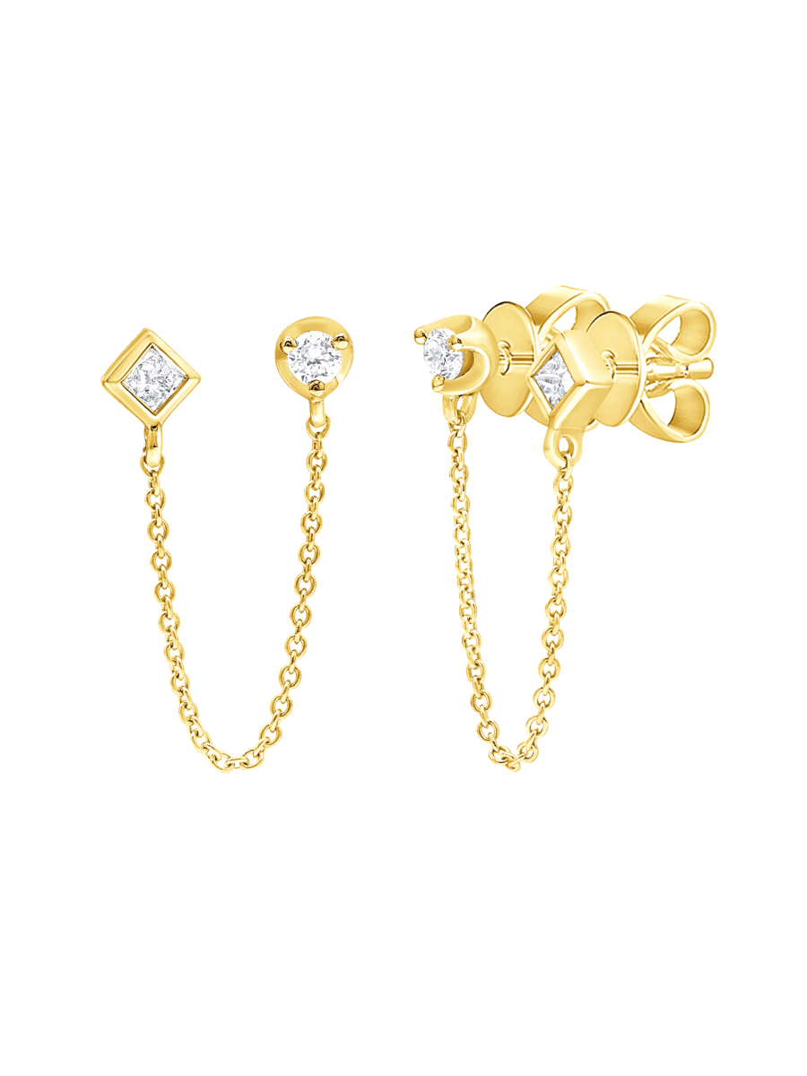 Double piercing earrings yellow gold and diamond stud on white background