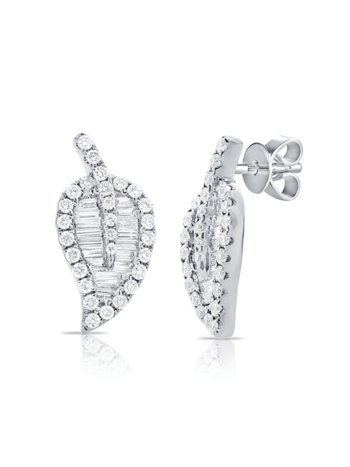 white gold round and baguette diamonds earrings in shape of a leaf on white background