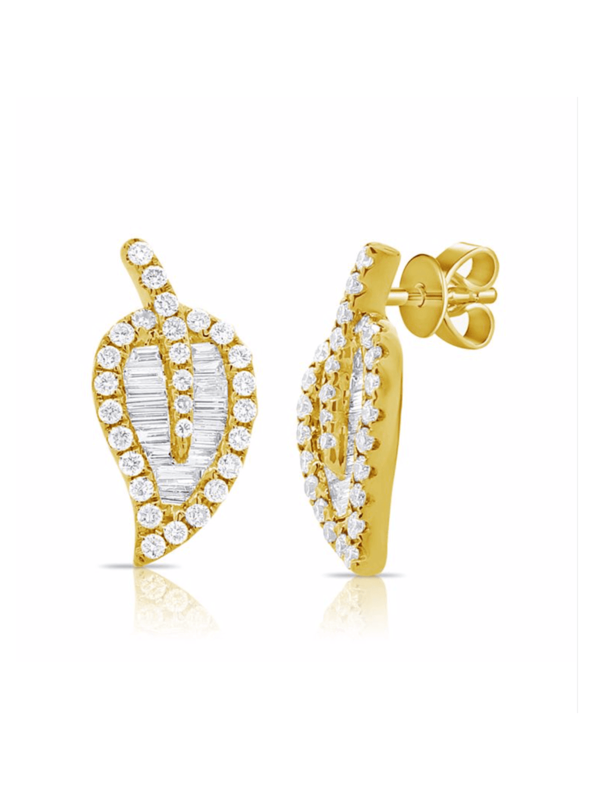 yellow gold round and baguette diamonds earrings in shape of a leaf on white background