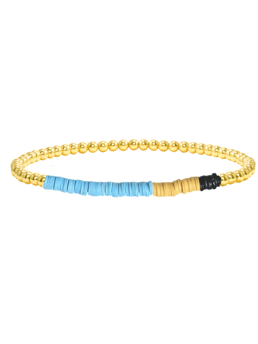Blue, yellow, and black african vinyl and gold bead stretch bracelet on white background