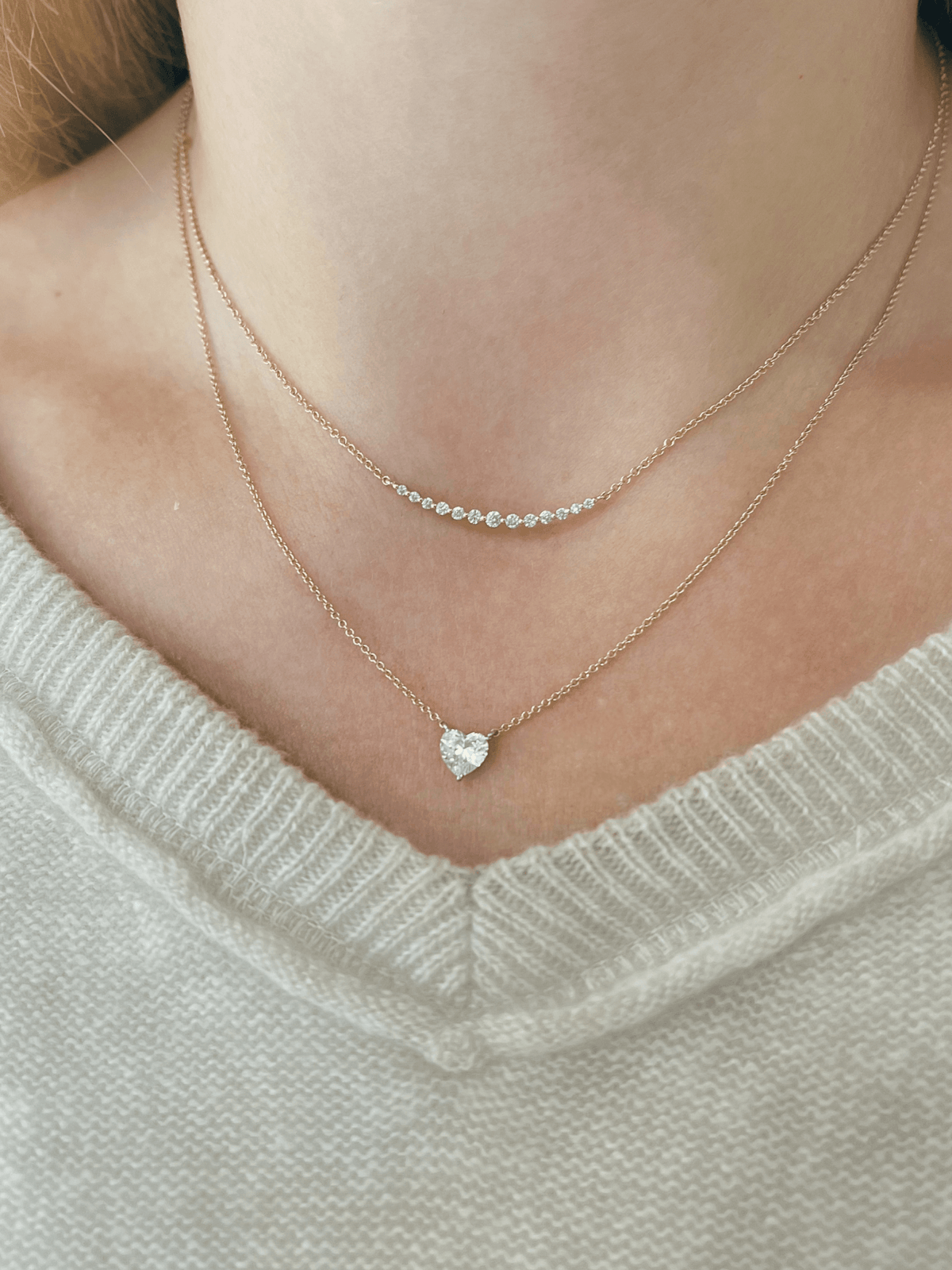 Diamond bar necklace yellow gold layered with single diamond heart necklace