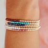 Crystal bracelets with gold filled beads on model wrist