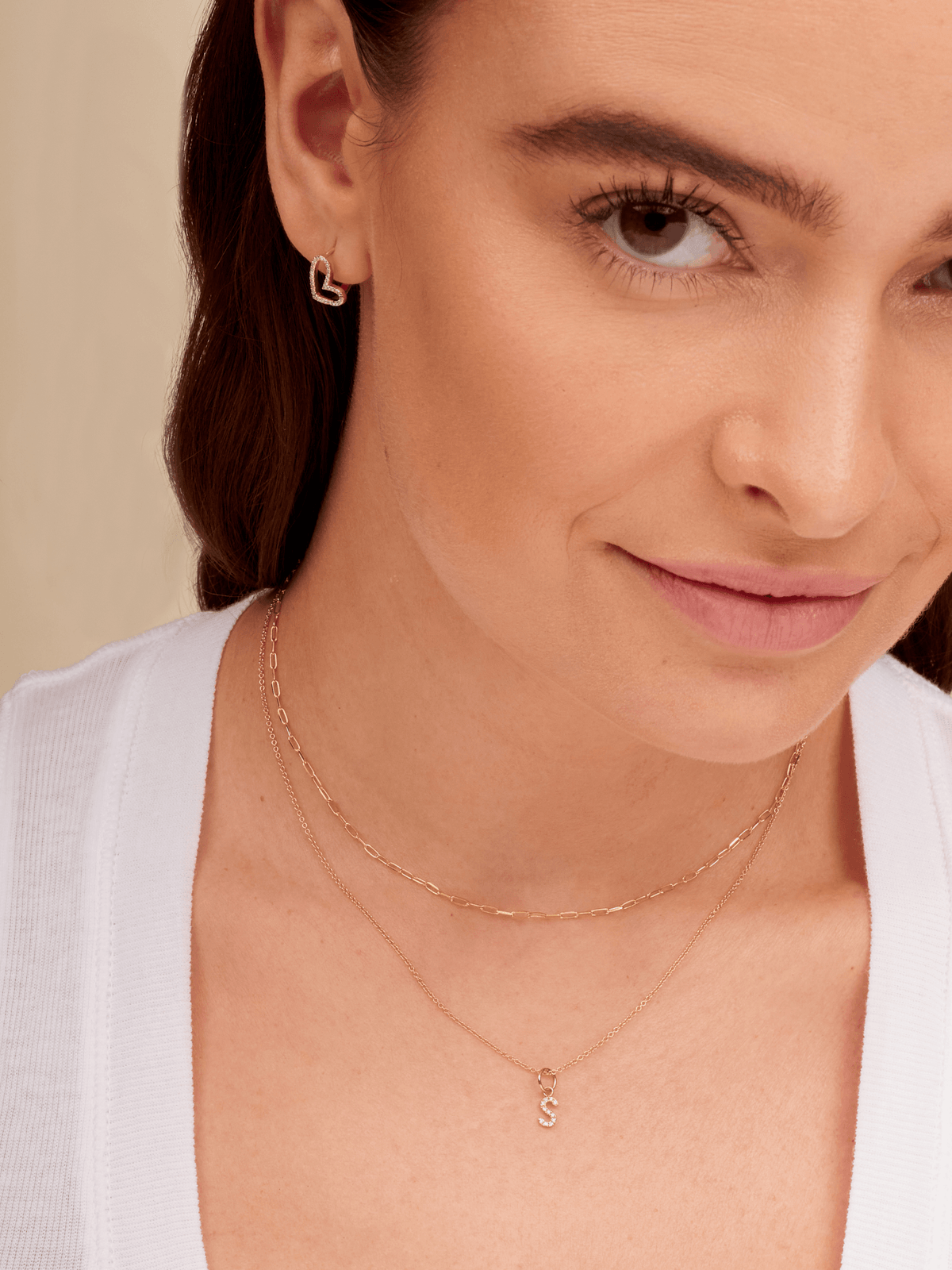Dainty gold chain link necklace layered with diamond initial necklace