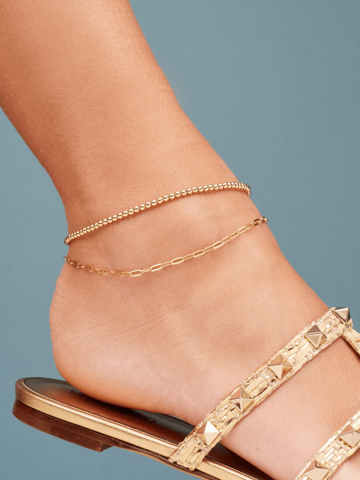 3mm Stretch Anklet layered with Paperclip Anklet on Women's Foot