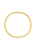 Gold bead stretch bracelet on white background
