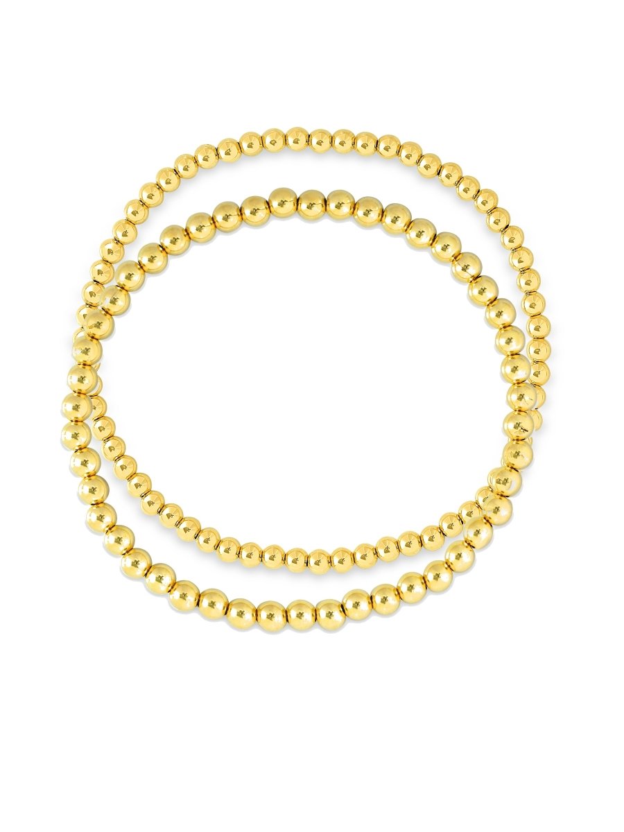 Stackable beaded stretch bracelets yellow gold 3mm and 4mm on white background
