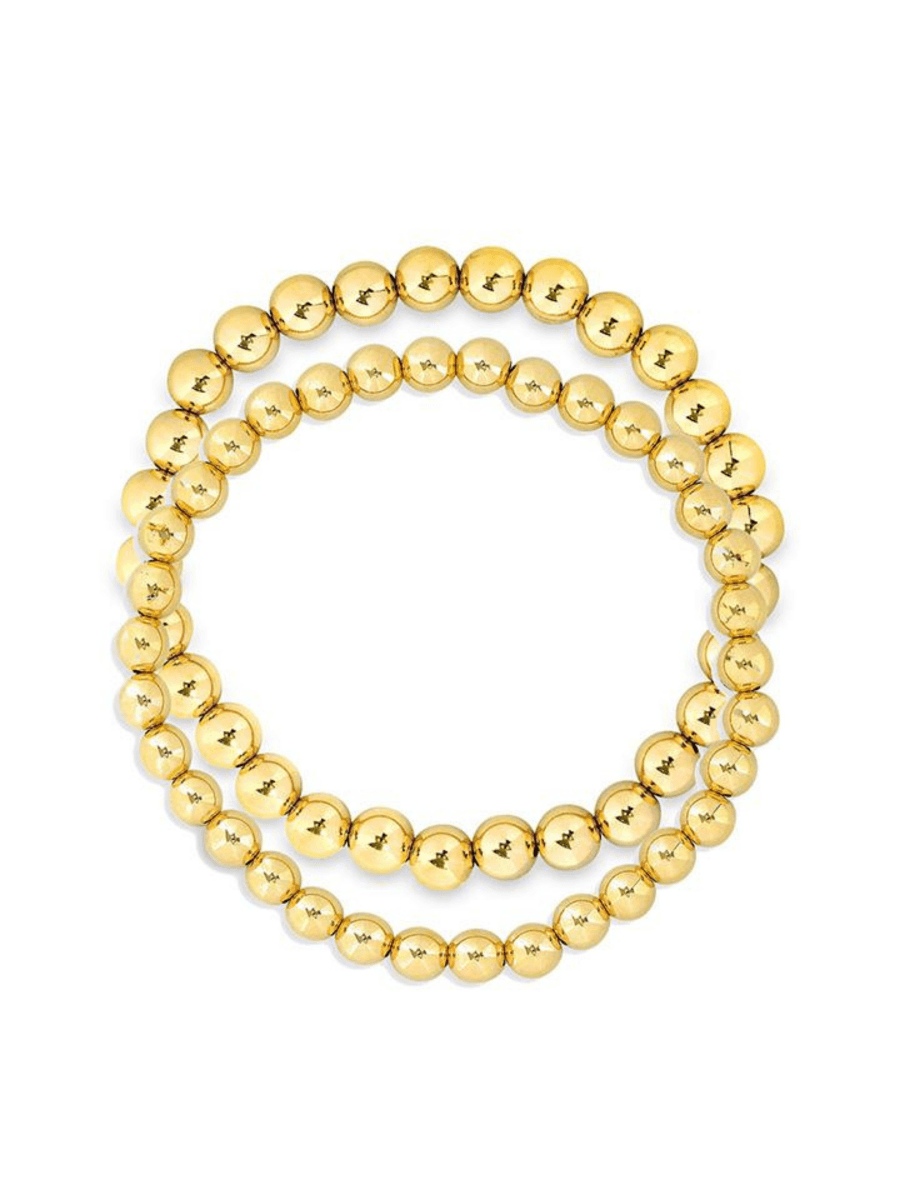 Gold beaded bracelet set 5mm and 6mm on white background