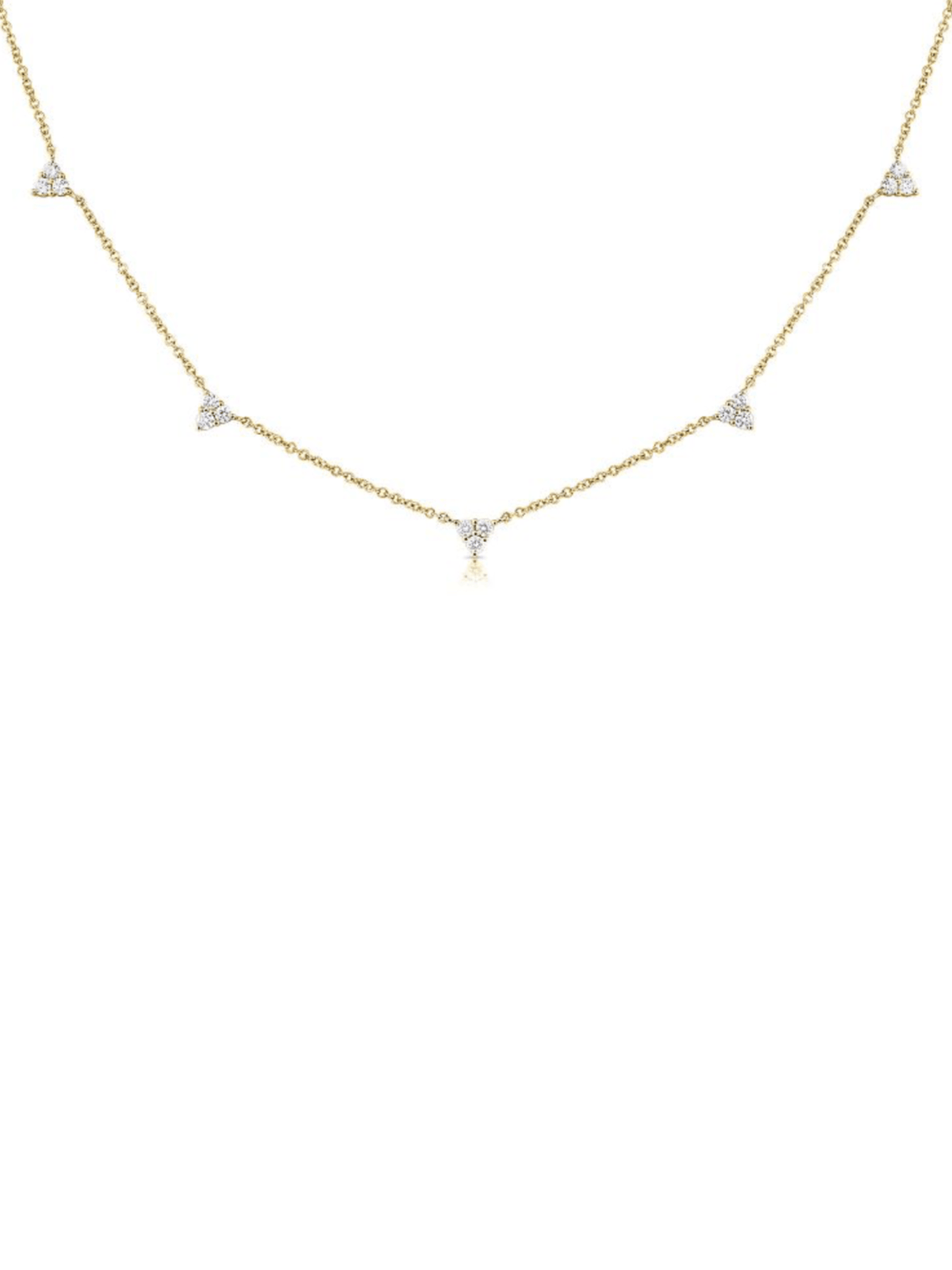 Yellow gold chain necklace with mini diamond trios stationed in between chain on white background