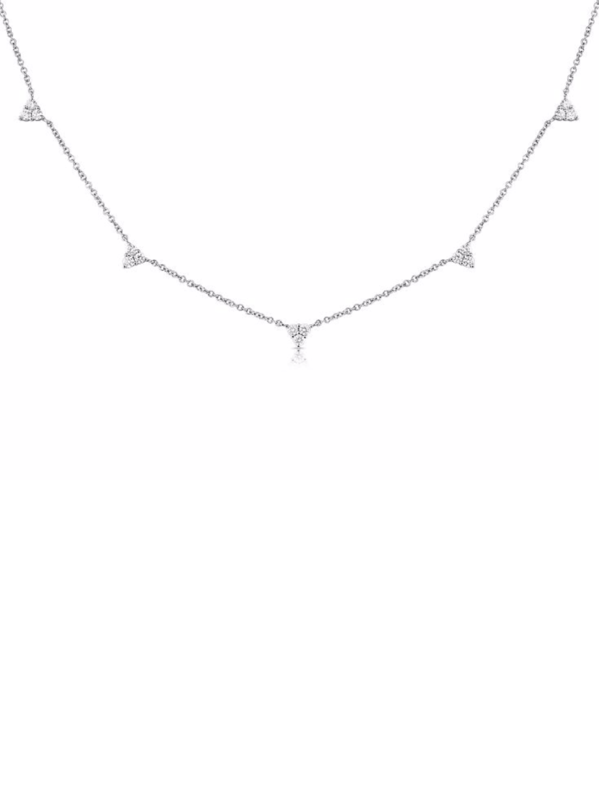 white gold chain necklace with mini diamond trios stationed in between chain on white background