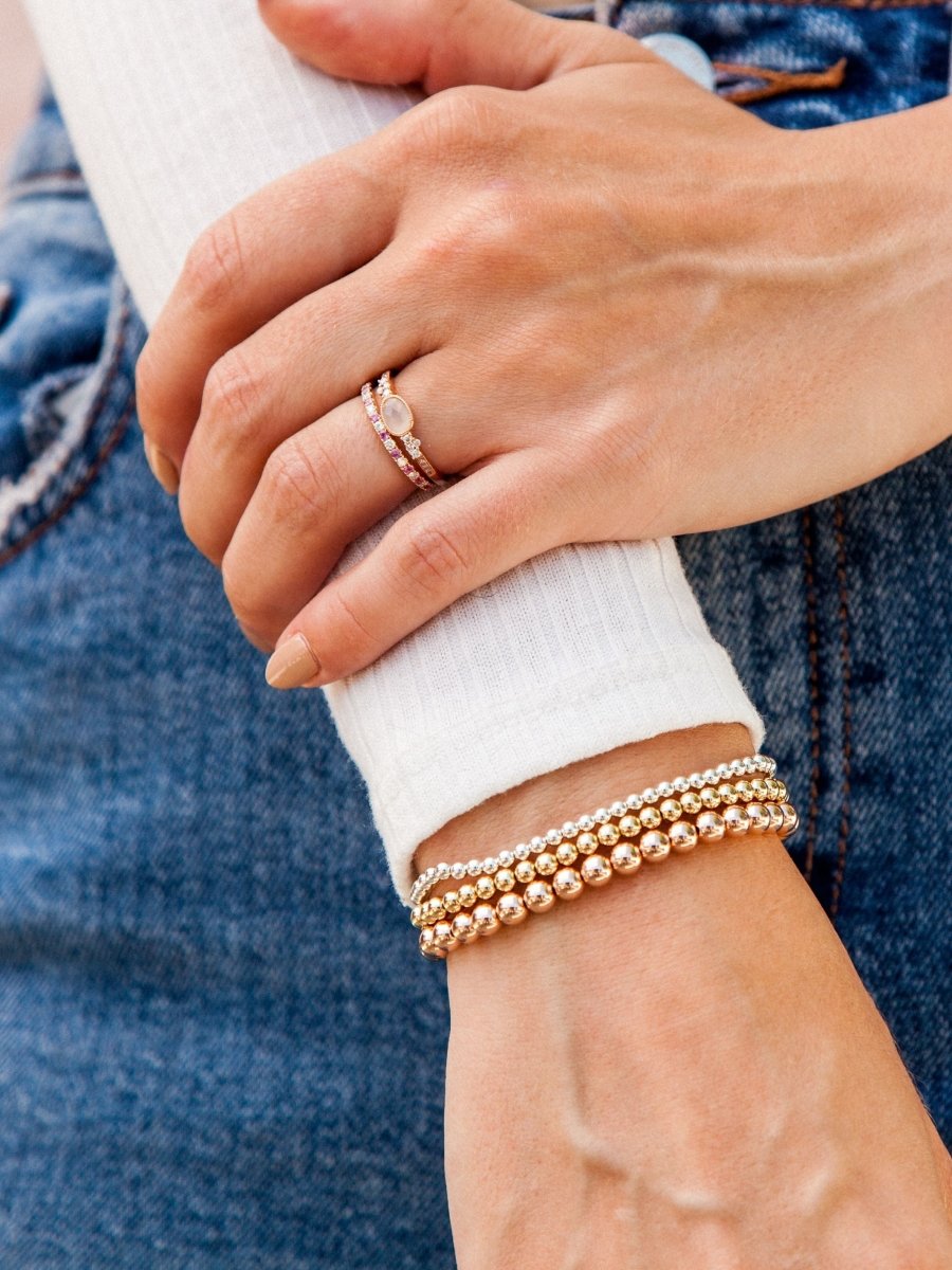 White gold ring and bracelet set on a hand with French manicure Stock Photo  by ©manager@profline.ae 171003016