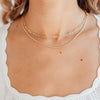 Small paperclip chain necklace layered with rope chain necklace