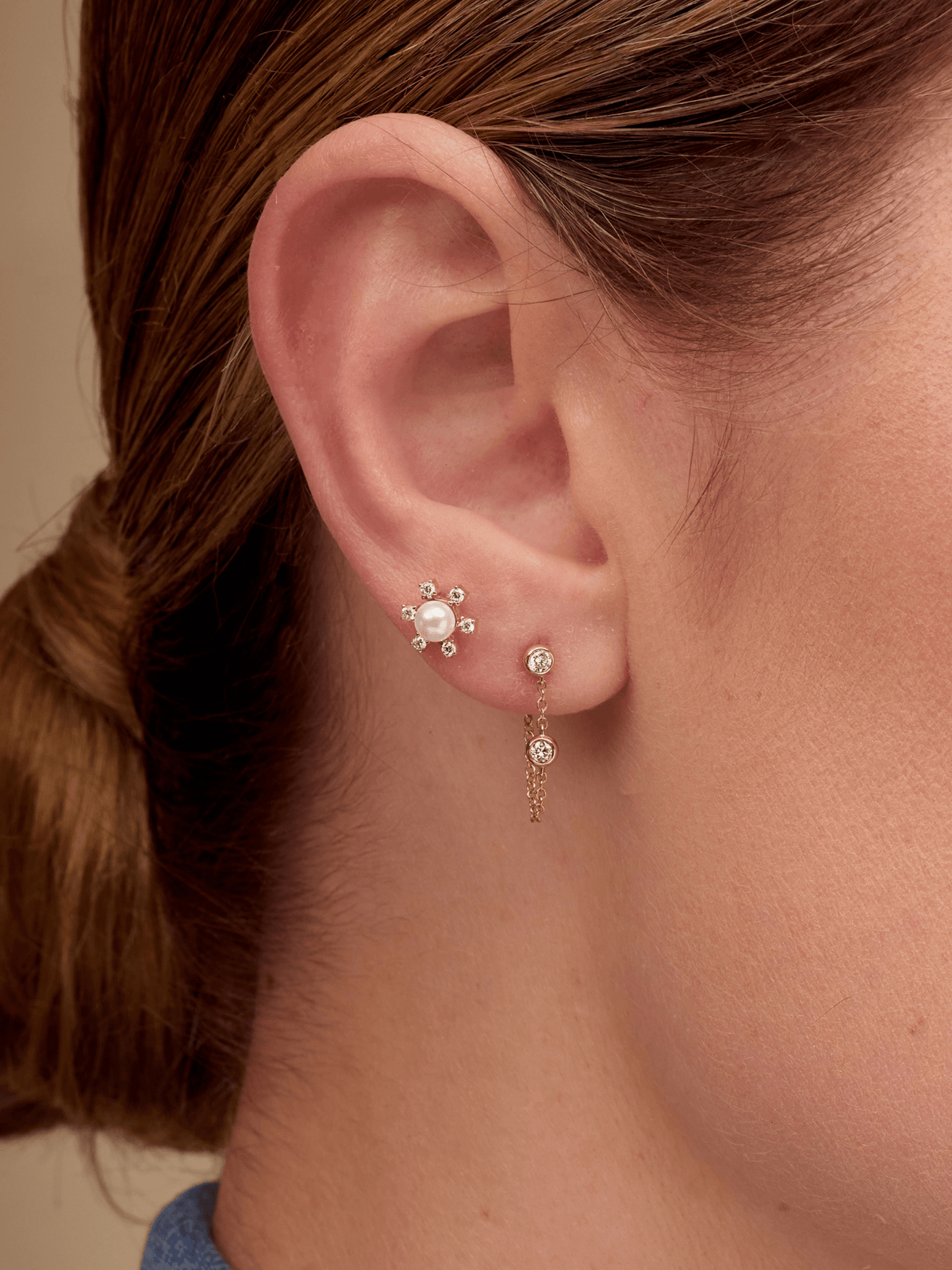 Pearl flower earring paired with diamond chain earring