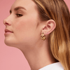 Tiny diamond earring paired with diamond bar stud and chunk gold earrings