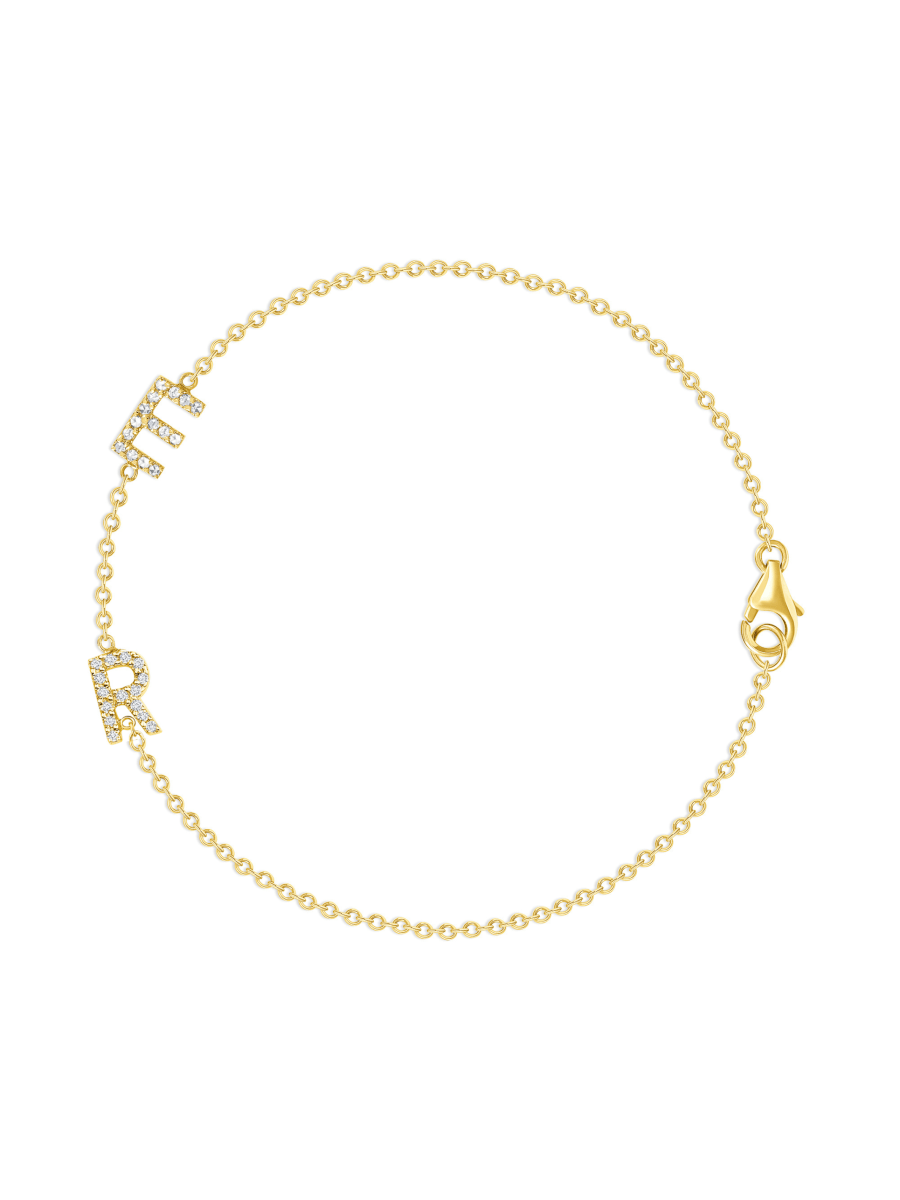 Dainty gold chain bracelet with two pave diamond initials
