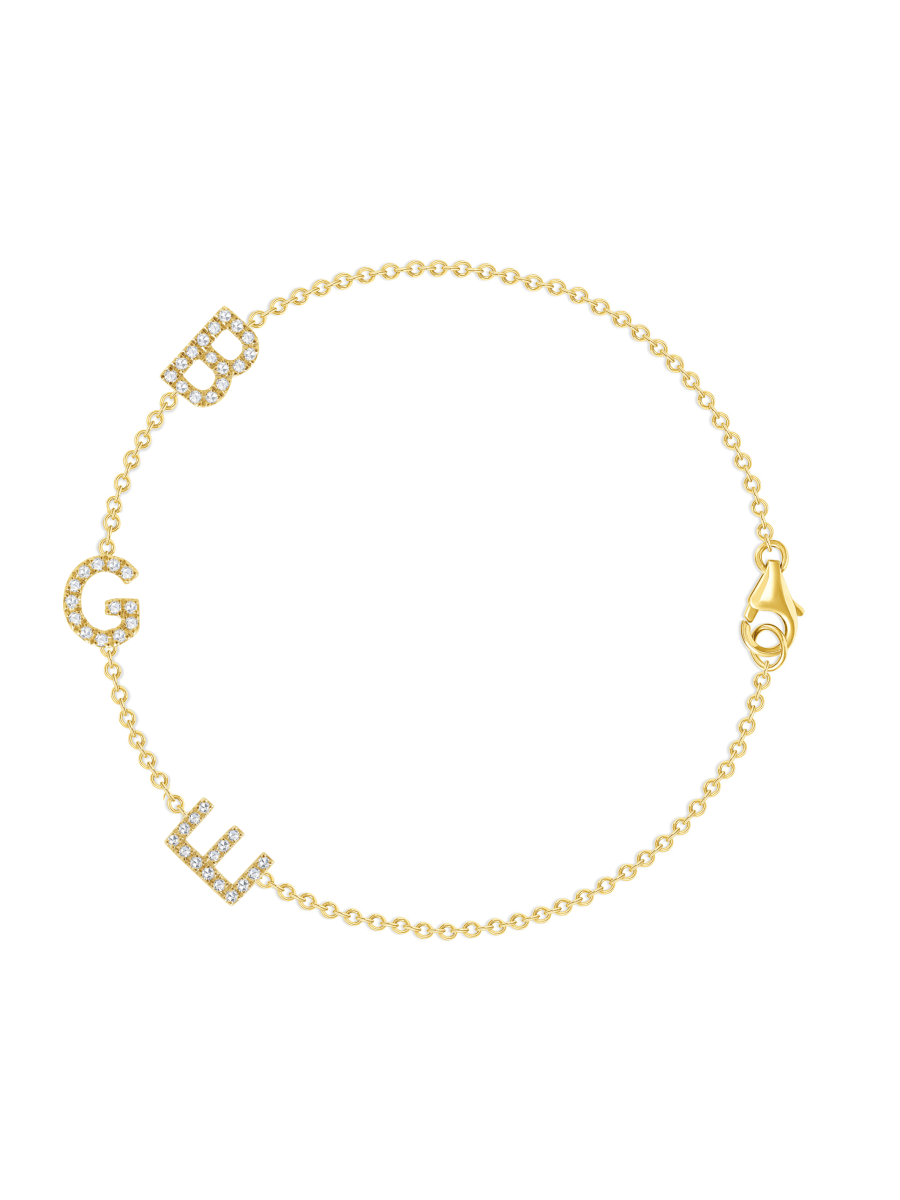 Dainty gold chain bracelet with three pave diamond initials