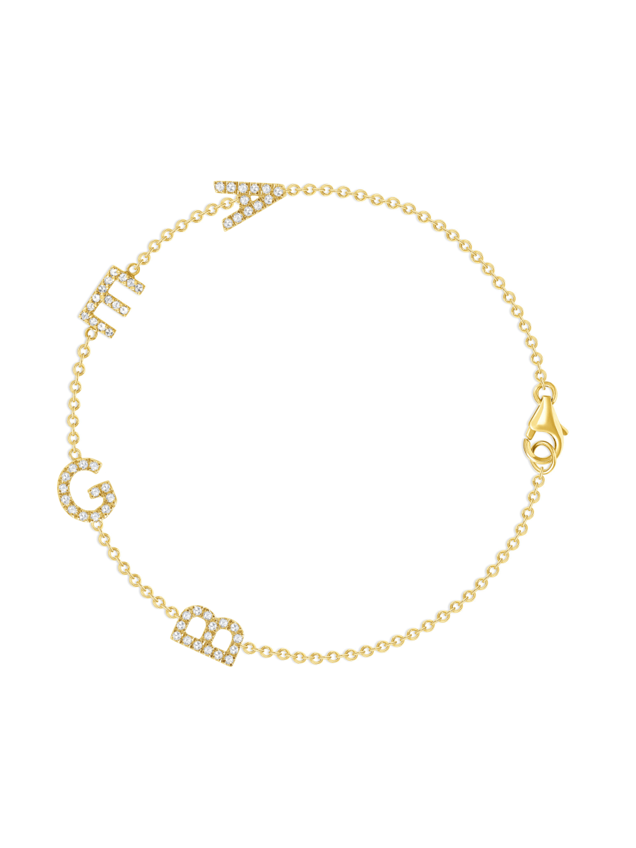 Dainty gold chain bracelet with four pave diamond initials