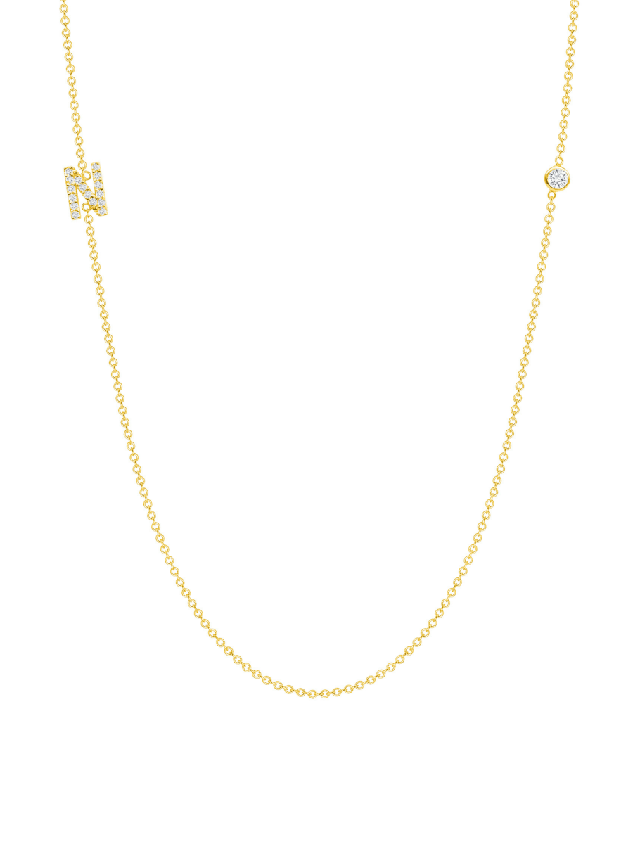 Diamond Initial Charm on Gold Chain with Round Diamond Bezel on White background