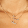 Three 14K diamond name charm necklaces on dainty gold chains