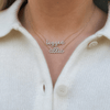 Two 14K diamond name charm necklaces on dainty gold chains