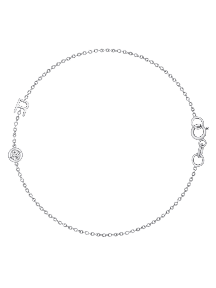 Dainty white gold chain bracelet with single initial and single diamond