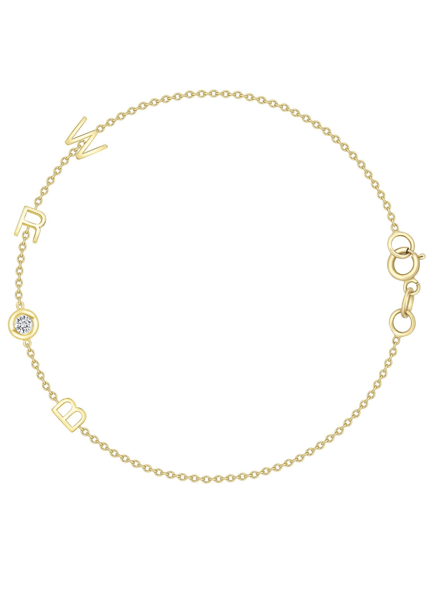 Dainty yellow gold chain bracelet with three initials and single diamond