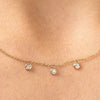 Gold diamond bezel necklace in yellow gold
